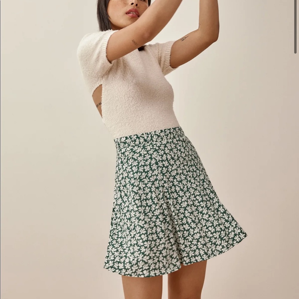 Size 4 perfect condition, next to new mini skirt.